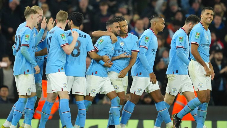 Manchester City players celebrate after Riyad Mahrez&#39;s goal against Liverpool