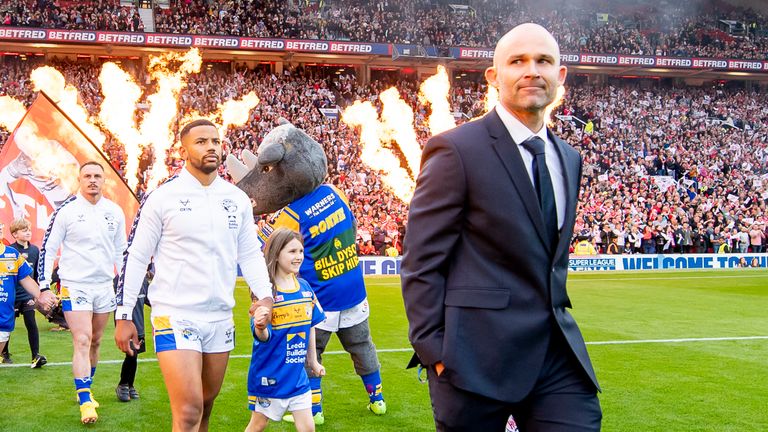 Picture by Allan McKenzie/SWpix.com - 24/09/2022 - Rugby League - Betfred Super League Grand Final - St Helens v Leeds Rhinos - Old Trafford, Manchester, England - Leeds' Rohan Smith leads his side out to the field of play with mascots.