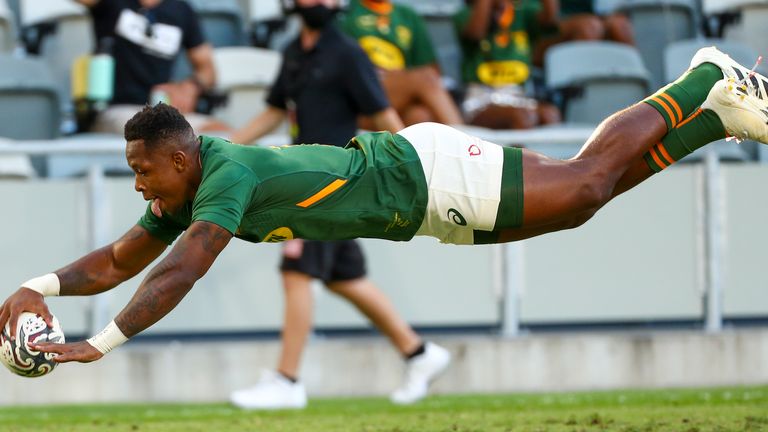 Sbu Nkosi scores a try against New Zealand in September 21