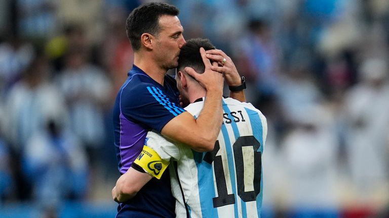 Argentina's head coach Lionel Scaloni kisses Argentina's Lionel Messi