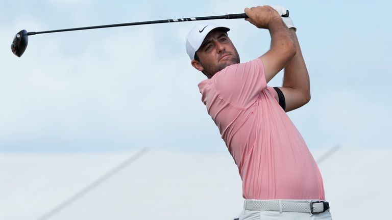 Scottie Scheffler, of the United States, watches his tee shot on the third tee during the final round of the Hero World Challenge PGA Tour at the Albany Golf Club, in New Providence, Bahamas, Sunday, Dec. 4, 2022. (AP Photo/Fernando Llano)