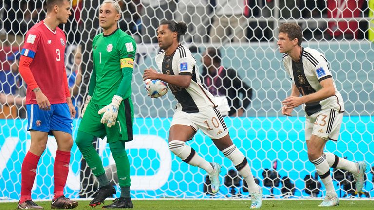 Serge Gnabry collects the ball after putting Germany ahead