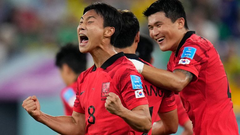 Seung-Ho Paik celebrates after pulling a goal back for South Korea