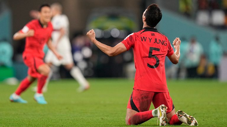 South Korea's Woo-young Jung celebrates after his team's 2-1 victory over Portugal