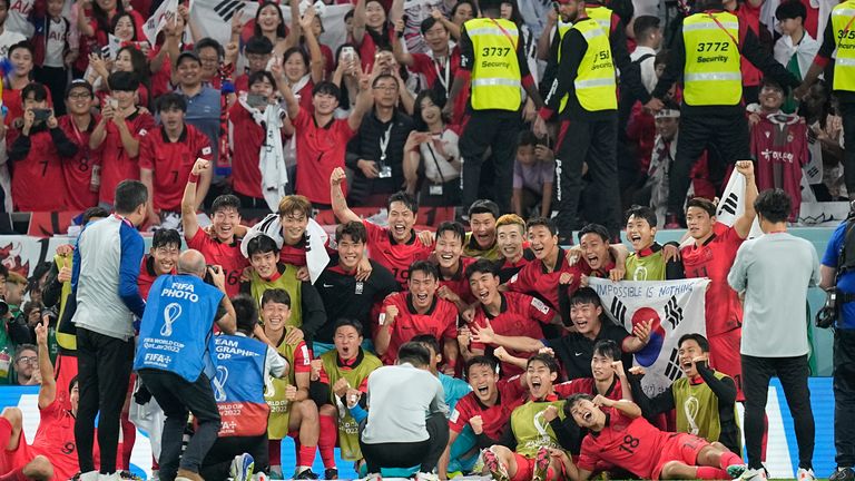 South Korea celebrate after the team's 2-1 victory over Portugal