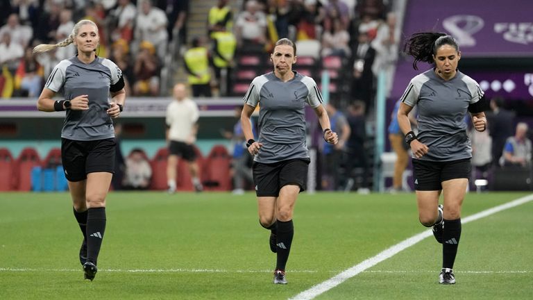 Match officials referee Stephanie Frappart (C), assistant referee Neuza Back (L) and assistant referee Karen Diaz (R) warm up prior to Costa Rica vs Germany