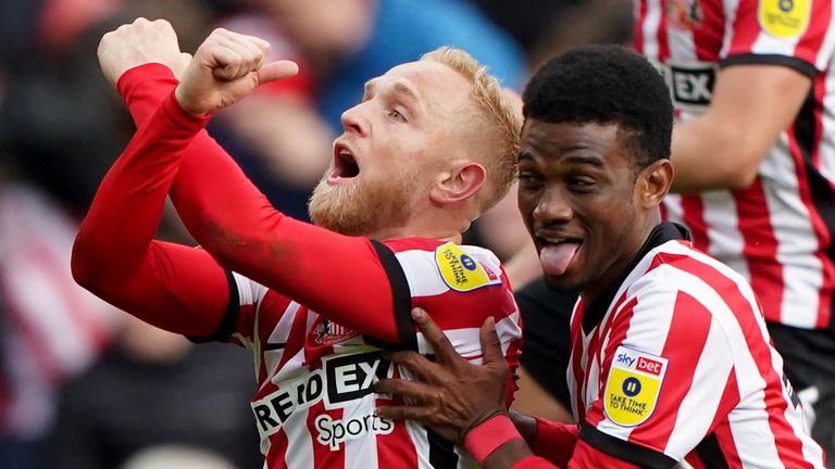 Alex Pritchard celebrates with Amad Diallo after putting Sunderland 2-0 up against Millwall