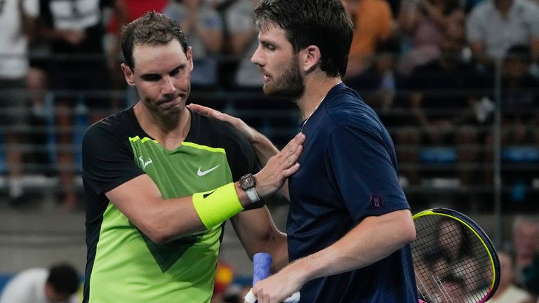 Britain&#39;s Cameron Norrie, right, is congratulated by Spain&#39;s Rafael Nadal after winning their Group D match at the United Cup tennis event in Sydney, Australia, Saturday, Dec. 31, 2022. (AP Photo/Mark Baker)