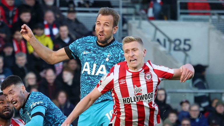 Harry Kane rises to pull a goal back for Spurs at Brentford