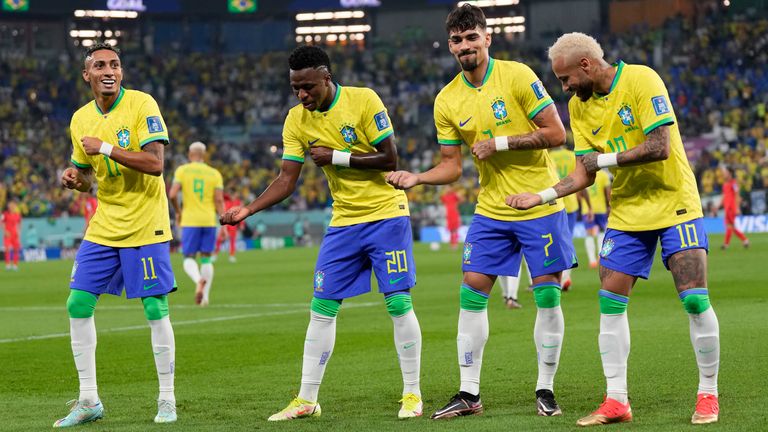 Brazil's Vinicius Junior celebrates with Raphinha, Lucas Paqueta and Neymar after scoring his side's opening goal