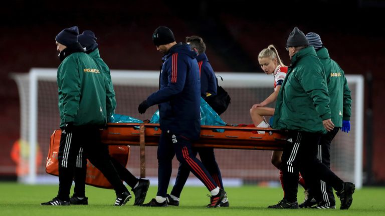 Arsenal striker Vivianne Miedema sheds tears as she is carried on a piggy bank
