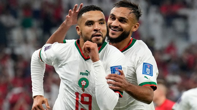 Morocco&#39;s Youssef En-Nesyri celebrates with team-mate Sofiane Boufal