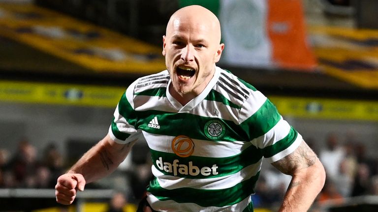 Aaron Mooy celebrates scoring to make it 2-0