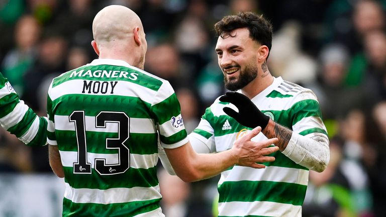 Celtic's Aaron Mooy celebrates with Sead Haksabanovic after making it 5-0
