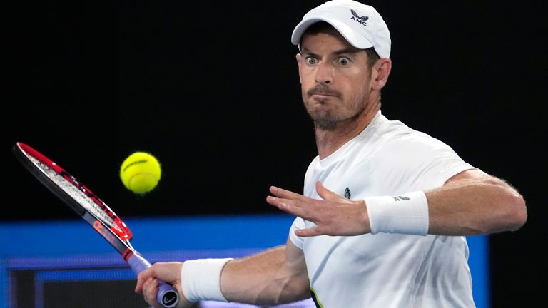 Andy Murray of Britain plays a forehand return to Thanasi Kokkinakis of Australia during their second round match at the Australian Open tennis championship in Melbourne, Australia, Thursday, Jan. 19, 2023. (AP Photo/Ng Han Guan)