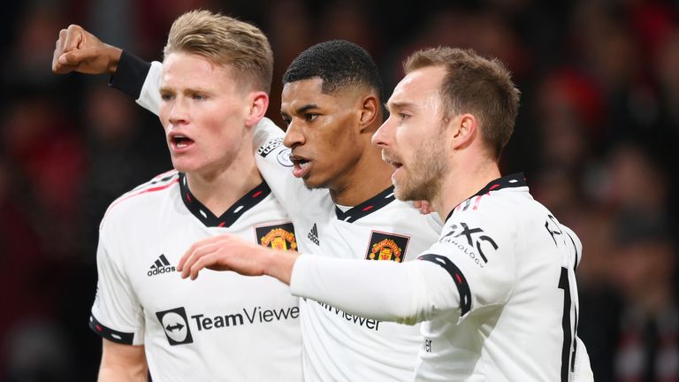 Marcus Rashford celebrates with Scott McTominay and Christian Eriksen after giving Manchester United the lead at Arsenal