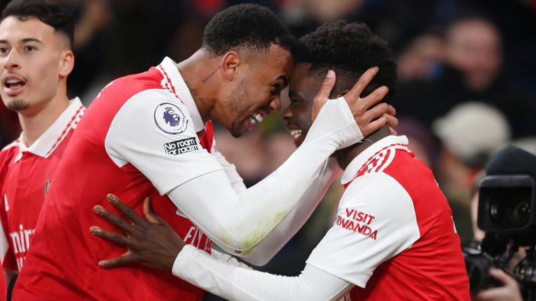 Bukayo Saka celebrates with teammate Gabriel after Arsenal's 2-1 win against Manchester United