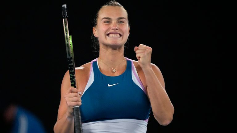 Aryna Sabalenka of Belarus celebrates after defeating Magda Linette of Poland during their semifinal match at the Australian Open tennis championship in Melbourne, Australia, Thursday, Jan. 26, 2023. (AP Photo/Aaron Favila)