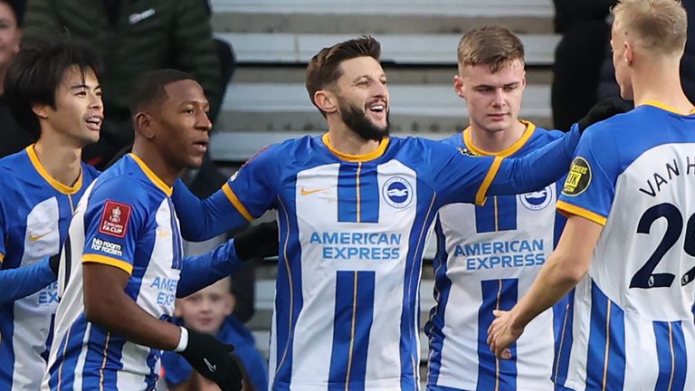 Adam Lallana is congratulated by his team-mates after putting Brighton 2-1 up against Middlesbrough