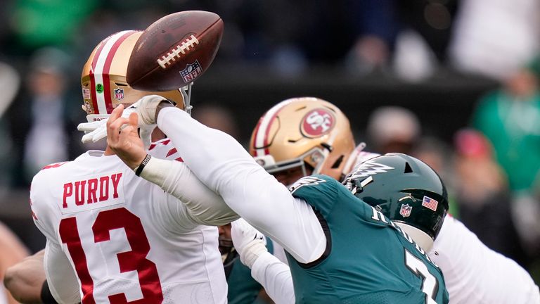 Philadelphia Eagles linebacker Haason Reddick, right, causes a fumble by San Francisco 49ers quarterback Brock Purdy during the first half of the NFC Championship NFL football game between the Philadelphia Eagles and the San Francisco 49ers on Sunday, Jan. 29, 2023, in Philadelphia. 