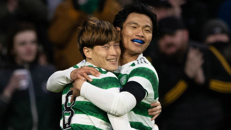Kyogo Furuhashi celebrates with Reo Hatate after doubling Celtic's advantage at Kilmarnock