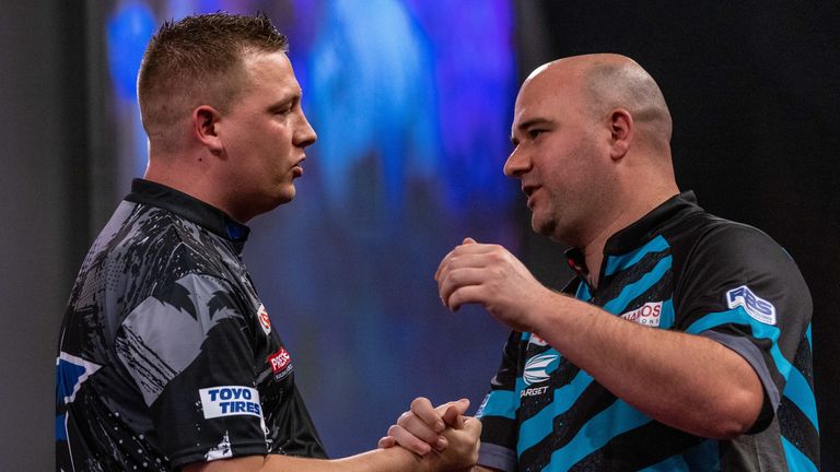 Rob Cross (right) had beaten Peter Wright to meet Dobey in the final