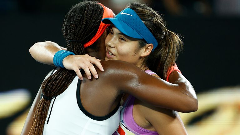 Coco Gauff (L) of the United States embraces Emma Raducanu of Great Britain after winning their round two singles match during day three of the 2023 Australian Open at Melbourne Park on January 18, 2023 in Melbourne, Australia. (Photo by Daniel Pockett/Getty Images)