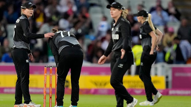 New Zealand's captain Sophie Devine, second left, reacts after their loss in the women's cricket T20 semifinal match against Australia at Edgbaston at the Commonwealth Games in Birmingham, England, Saturday, Aug. 6, 2022. (AP Photo/Aijaz Rahi)