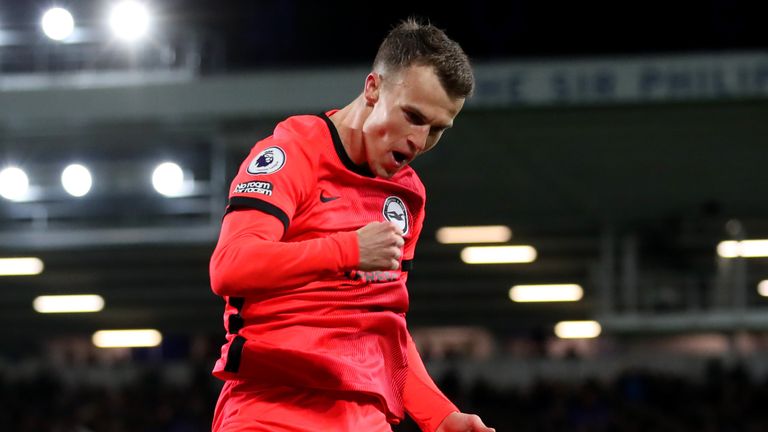 Solly March celebrates after scoring Brighton&#39;s third goal against Everton