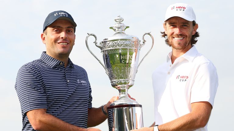 ABU DHABI, UNITED ARAB EMIRATES - JANUARY 11: Francesco Molinari, Captain of Continental Europe, and Tommy Fleetwood, Captain of Great Britain and Ireland, pose with the trophy prior to the Hero Cup at Abu Dhabi Golf Club on January 11, 2023 in Abu Dhabi, United Arab Emirates. (Photo by Andrew Redington/Getty Images)