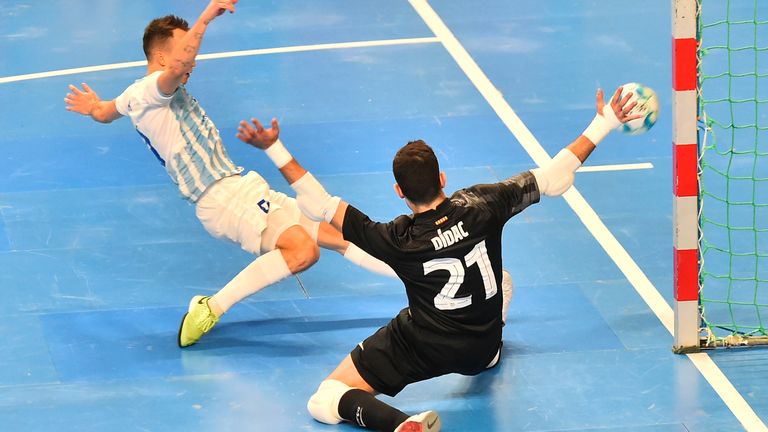 Gabriel Rick of Pilsen, Didac Plana of Barcelona in action during the UEFA Futsal Champions League Elite round Group C match SK Plzen vs. FC Barcelona played in Pilsen, Czech Republic, on December 4, 2021.