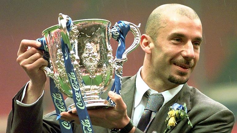 Chelsea&#39;s player and manager Gianluca Vialli celebrates with the Coca-Cola Cup trophy after his Chelsea team beat Middlebrough 2-0 in the final at London&#39;s Wembley stadium Sunday March 29, 1998. 