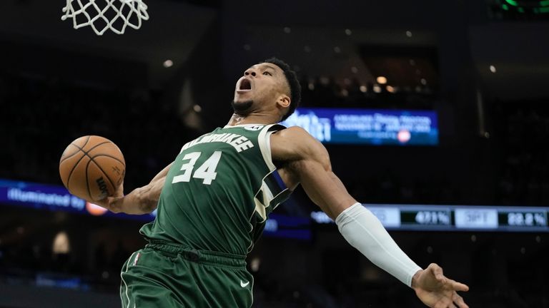 Milwaukee Bucks' Giannis Antetokounmpo dunks during the first half of an NBA basketball game Tuesday, Jan. 3, 2023, in Milwaukee