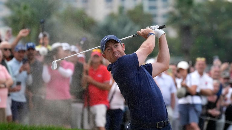 Rory McIlroy of Northern Ireland plays his second shot on the 1st hole during the third round of the Dubai Desert Classic, in Dubai, United Arab Emirates, Saturday, Jan. 28, 2023. (AP Photo/Kamran Jebreili)