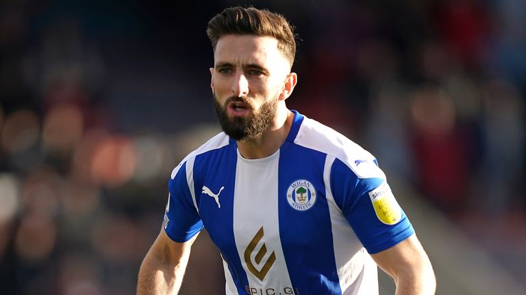 Graeme Shinnie rejoins Aberdeen from Wigan after previously spending four years at Pittodrie