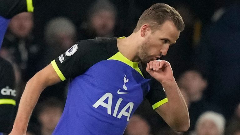 Tottenham's Harry Kane celebrates after scoring his side's first goal at Fulham