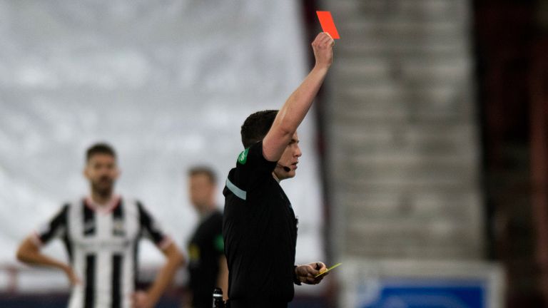 Hearts' manager Robbie Neilson is shown a red card by referee David Munro