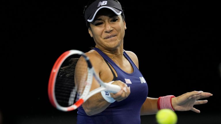 Heather Watson of Britain returns a shot to Storm Sanders of Australia, during the semi-finals match of the Billie Jean King Cup tennis tournament, at the Emirates Arena in Glasgow, Scotland, Saturday, Nov. 12, 2022. (AP Photo/Kin Cheung)