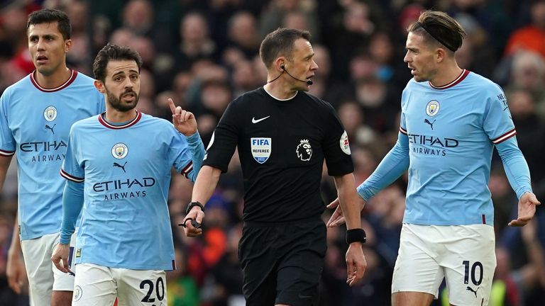 Manchester City's Jack Grealish and Bernardo Silva appeal to referee Stuart Attwell after Man Utd's equaliser