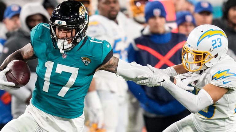 Jags QB Lawrence makes playoff history with 4 1st-half picks