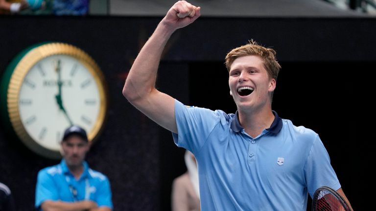 Jenson Brooksby of the U.S. celebrates after defeating Casper Ruud of Norway in their second round match at the Australian Open tennis championship in Melbourne, Australia, Thursday, Jan. 19, 2023. (AP Photo/Dita Alangkara)