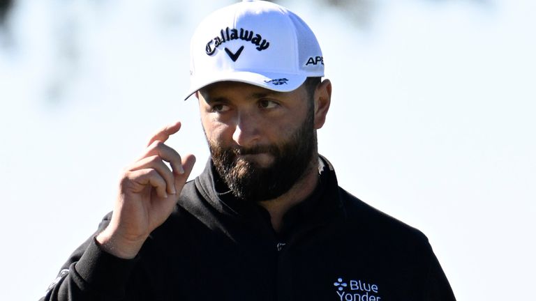 Jon Rahm, of Spain, acknowledges the crowd after chipping in for a birdie on the 11th hole of the North Course at Torrey Pines during the second round of the Farmers Insurance Open golf tournament, Thursday, Jan. 26, 2023, in San Diego. (AP Photo/Denis Poroy)