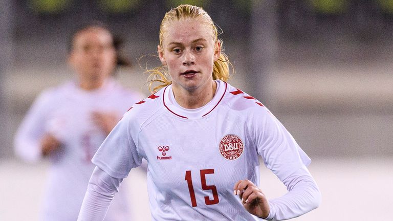 Denmark&#39;s Kathrine Kuhl controls the ball during friendly match against Switzerland