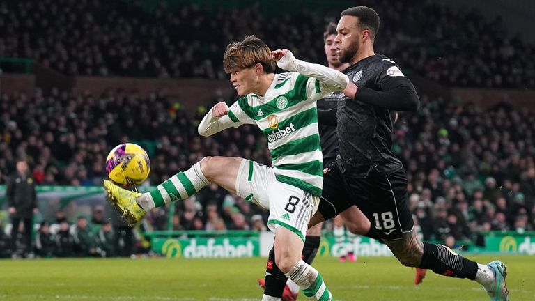 Kyogo Furuhashi scores with a brilliant lob to net Celtic&#39;s second