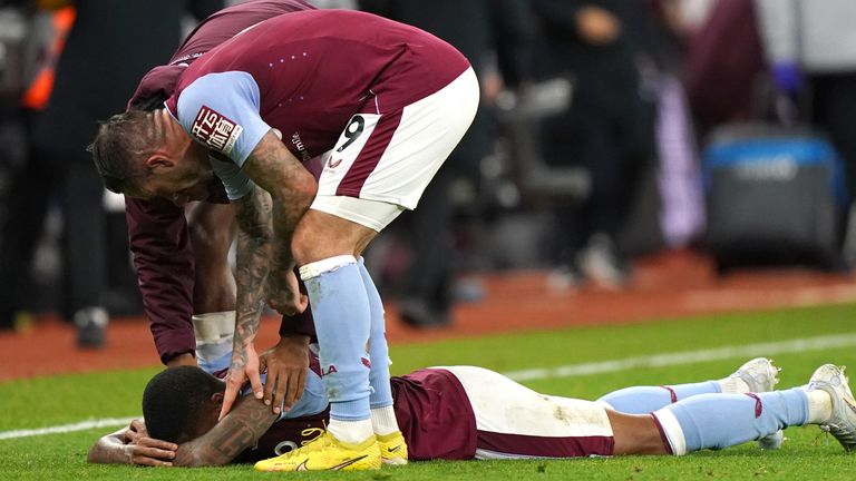Aston Villa forward Leon Bailey consoled at full time after missing a golden opportunity to score the winner against Wolves.