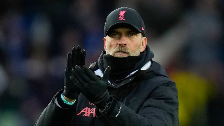 Jurgen Klopp applauds the travelling fans after the 2-1 loss