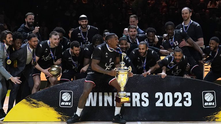 London Lions' Ovie Soko lifts the trophy after beating the Leicester Riders to win the British Basketball Cup Final match at the Utilita Arena Birmingham. Picture date: Sunday January 29, 2023.