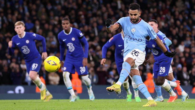 Riyad Mahrez scores Manchester City's fourth goal from the penalty spot