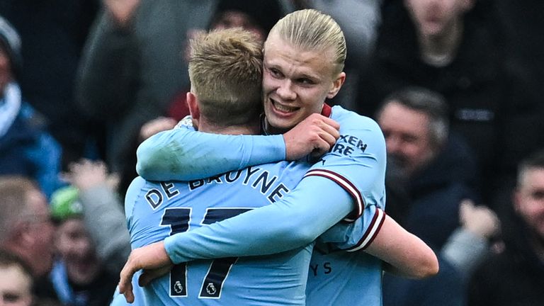 Erling Haaland celebrates with Kevin De Bruyne after opening the scoring for Man City against Wolves