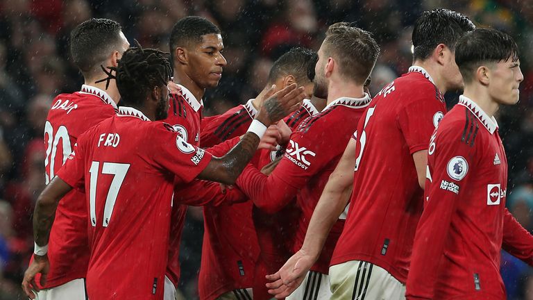 Marcus Rashford is mobbed by his team-mates after scoring Manchester United's third goal against Bournemouth